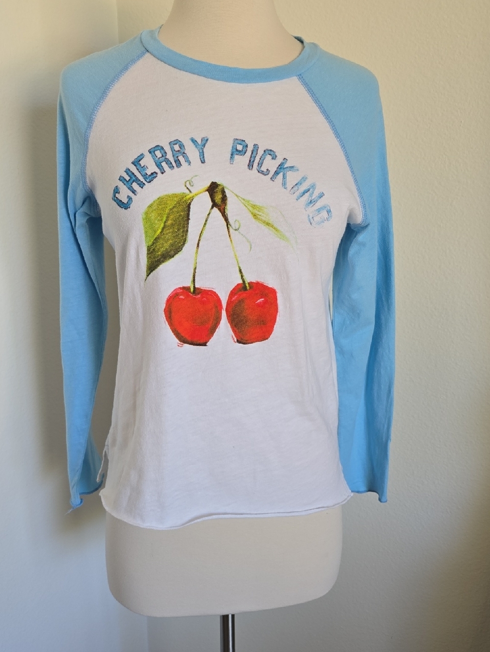 MOTHER White Tee with Light Blue Raglan Sleeves and Cherry Graphic